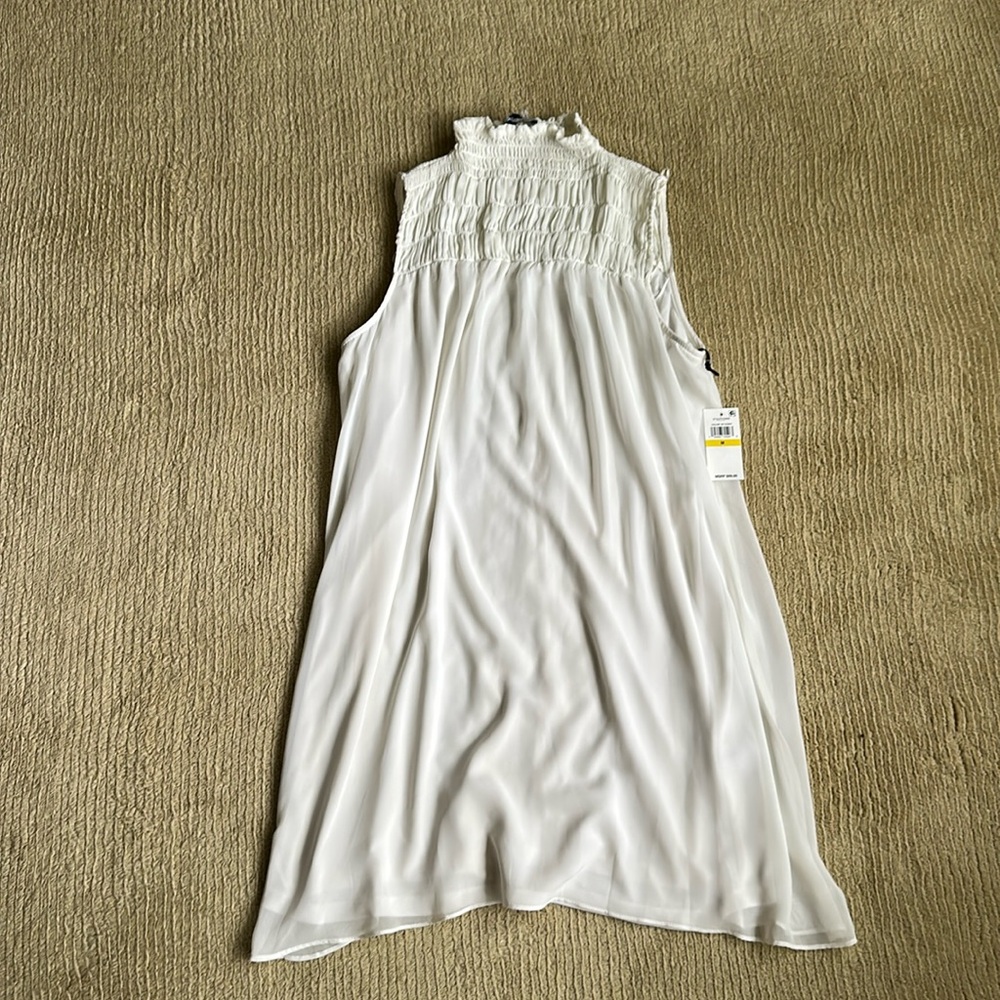Ivory flowy mini dress. 1. State. New with tags.